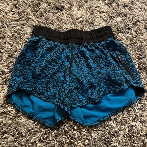 Lulu lemon Blue and black tracker shorts, in good condition.